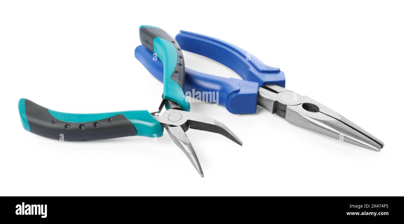 Different pliers isolated on white. Construction tool Stock Photo