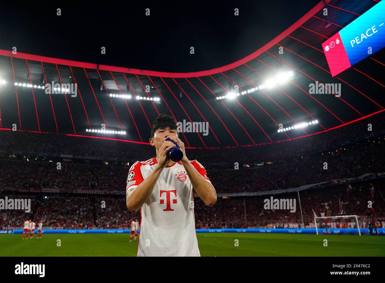Munich, Germany. 30th Apr, 2024. Min-Jae Kim of Bayern Munchen drinks water before the kick-off during the UEFA Champions League match, Semi-finals, first leg, between Bayern Munchen and Real Madrid played at Allianz Stadium on April 30, 2024 in Munich, Germany. (Photo by Bagu Blanco/PRESSINPHOTO) Credit: PRESSINPHOTO SPORTS AGENCY/Alamy Live News Stock Photo