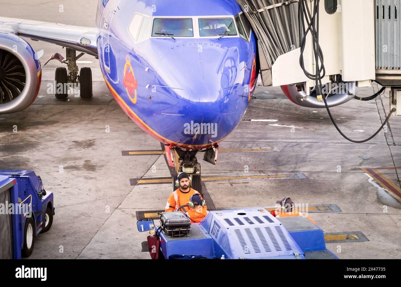 Miami, Florida, USA - 03 14 2024: A cockpit of Boeing 737 MAX 8 jet airliner sporting Canyon Blue livery of Southwest Airlines with a crew of airport Stock Photo