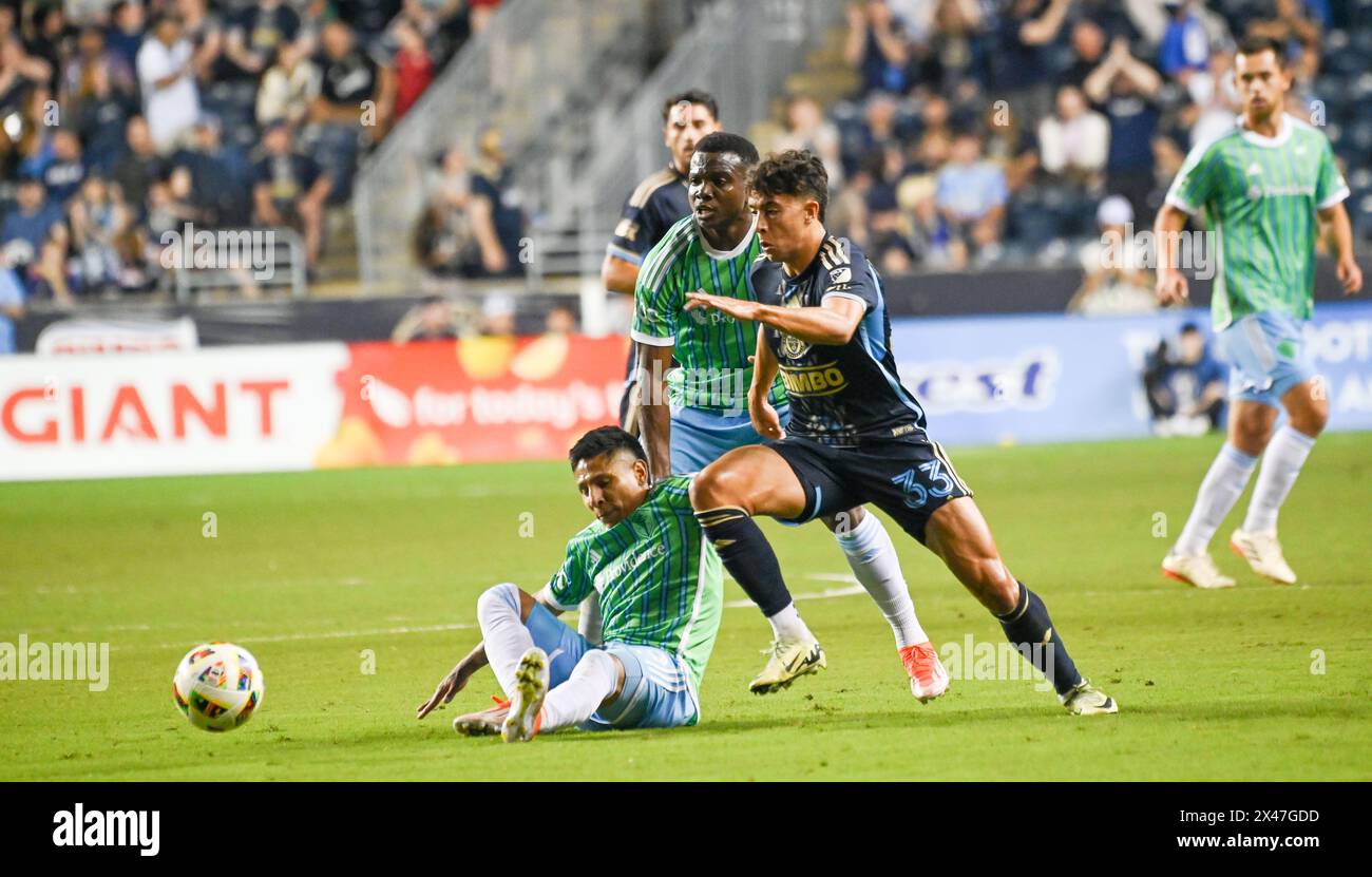 Chester, Pennsylvania, USA. 30th Apr, 2024. April 30, 2024, Chester PA, USA: Seattle Sounders FC player, RAUL RUIDIAZ (9) fights for the ball against Philadelphia Union player, QUINN SULLIVAN (33) during the match. Credit Image: © Ricky Fitchett via ZUMA Wire (Credit Image: © Ricky Fitchett/ZUMA Press Wire) EDITORIAL USAGE ONLY! Not for Commercial USAGE! Stock Photo