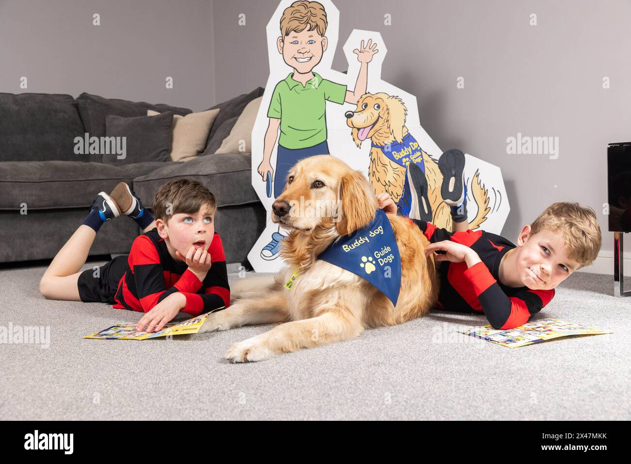 EDITORIAL USE ONLY Alex McQueen (left), age 7, with his brother Ross, age 9, from Sutton
