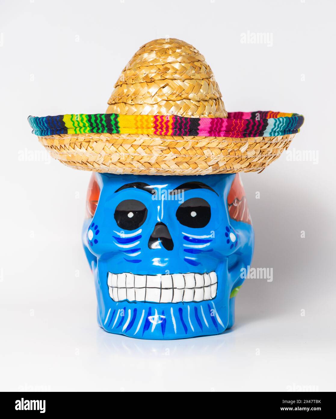 colorful blue sugar skull wearing a sombrero for cinco de mayo Stock Photo