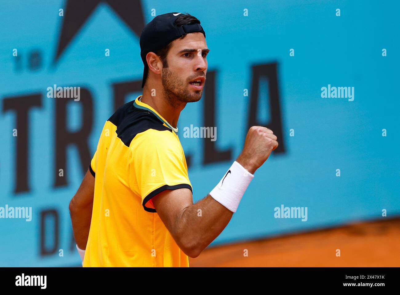 Karen Khachanov of Russia in action against Jannik Sinner of Italy during the Mutua Madrid Open 2024, ATP Masters 1000 and WTA 1000, tennis tournament on April 30, 2024 at Caja Magica in Madrid, Spain Stock Photo
