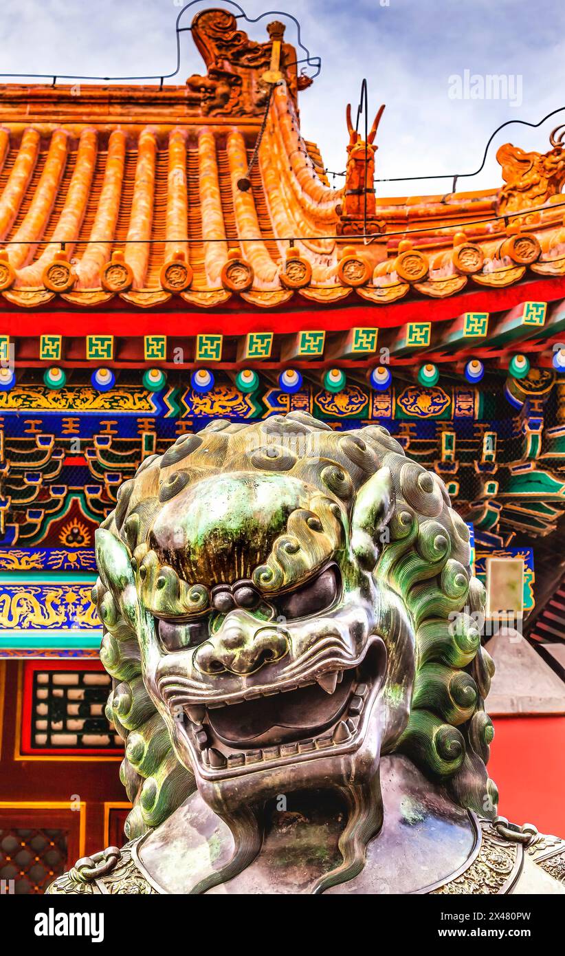 Dragon bronze statue, Summer Palace ornate roof, Beijing, China. Dragon