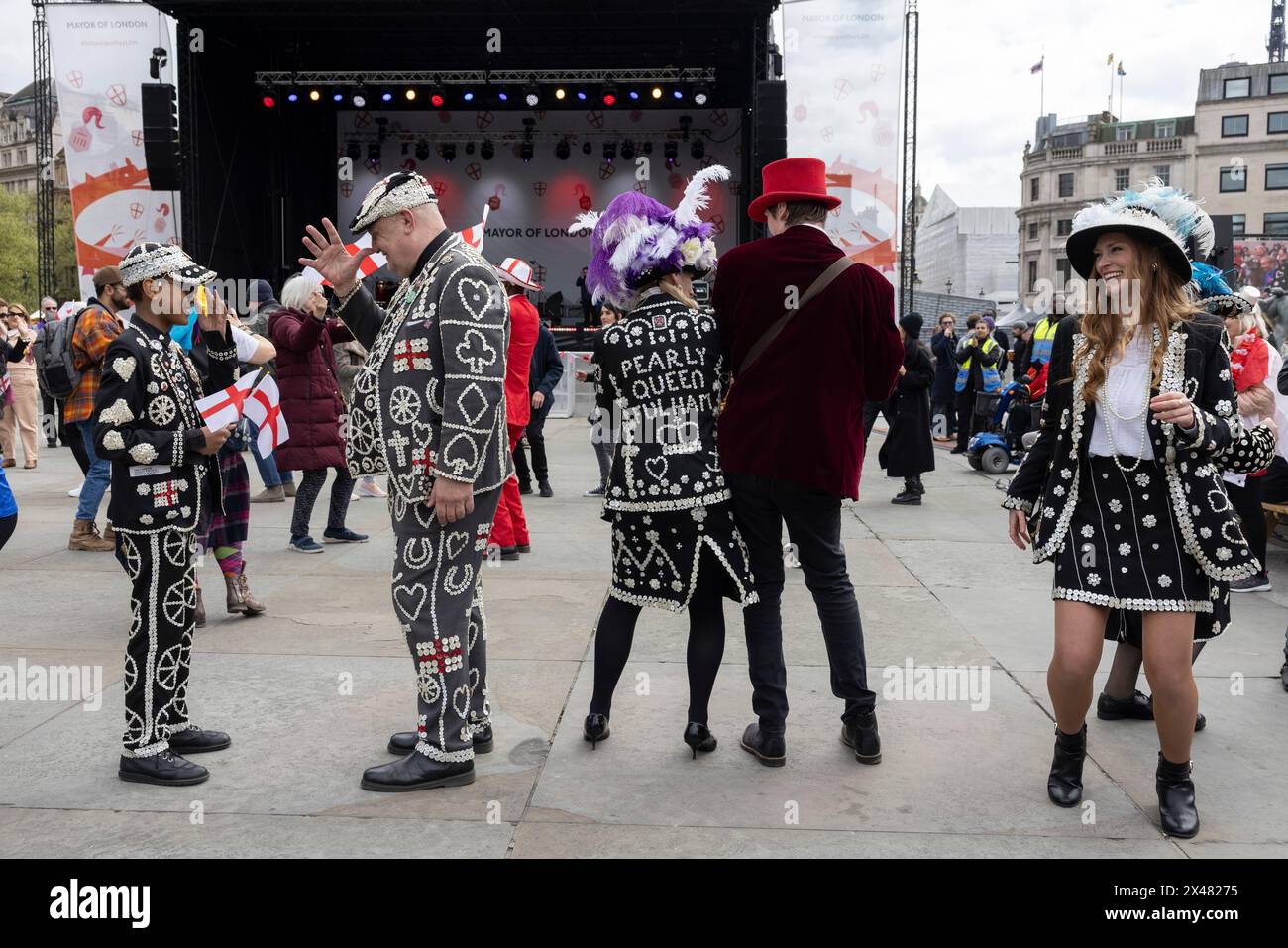 The Feast of St. George Festival in Trafalgar Square, April 23rd 2024 including Pearly Kings and Queens to celebrate celebrate Patron Saint of England. Stock Photo