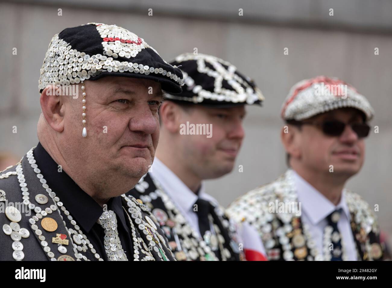The Feast of St. George Festival in Trafalgar Square, April 23rd 2024 including Pearly Kings and Queens to celebrate celebrate Patron Saint of England. Stock Photo
