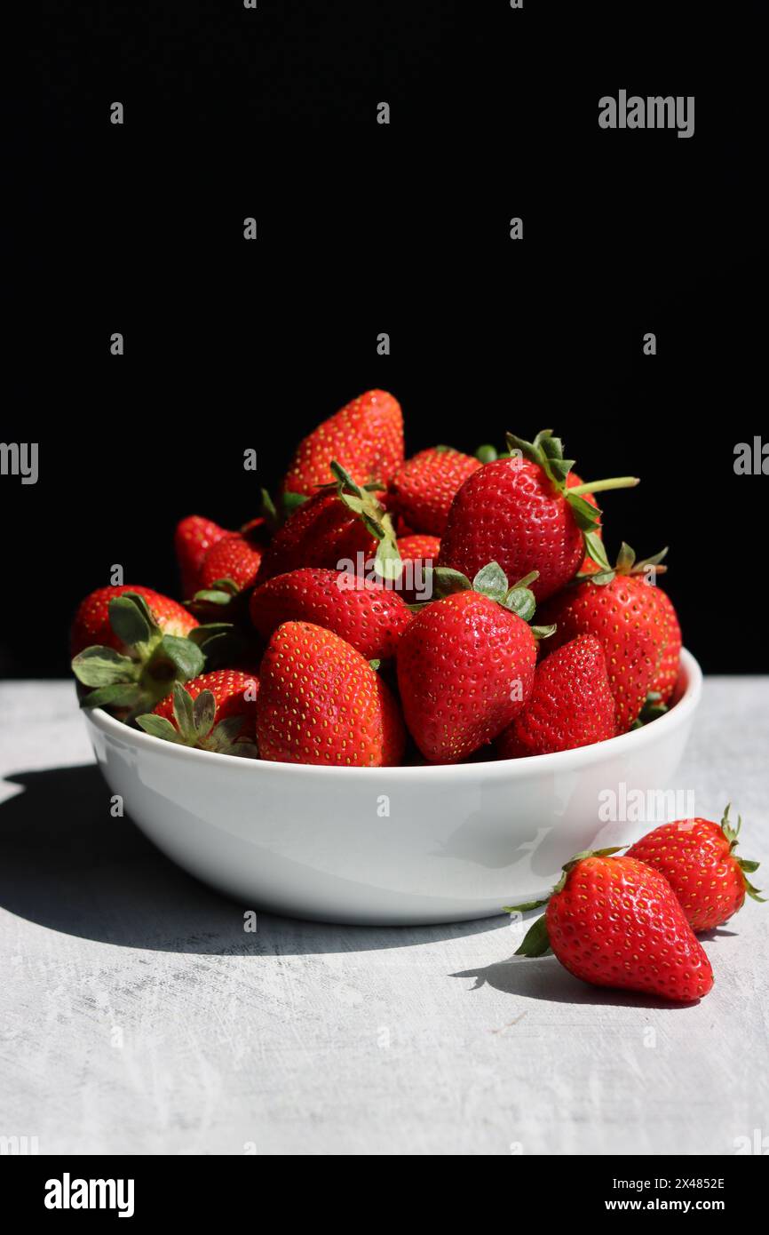 Red ripe strawberries background. Strawberry texture close up photo. Fresh organic berries macro. Eating fresh concept. Stock Photo