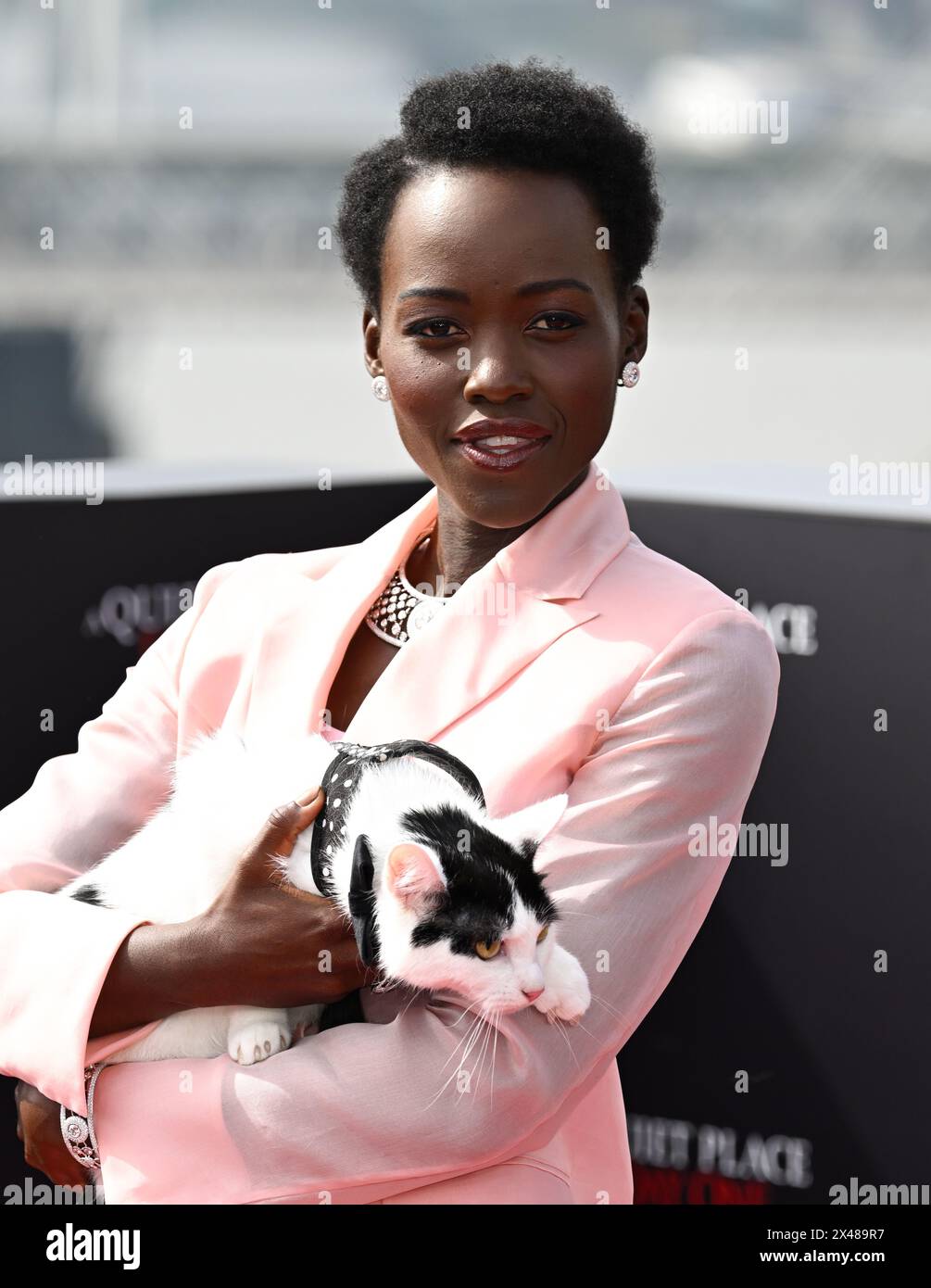 London, UK. May 1st, 2024. Lupita Nyong’o and Frodo the Cat at A Quiet ...