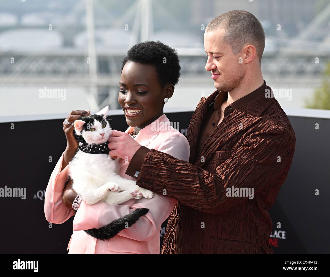 London, UK. May 1st, 2024. Lupita NyongÕo, Joseph Quinn and Frodo the ...