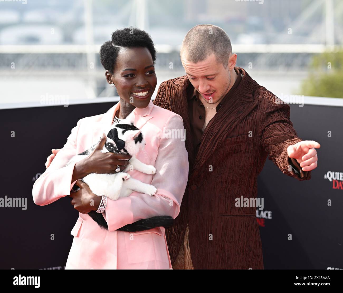 London, UK. May 1st, 2024. Lupita NyongÕo, Joseph Quinn and Frodo the ...