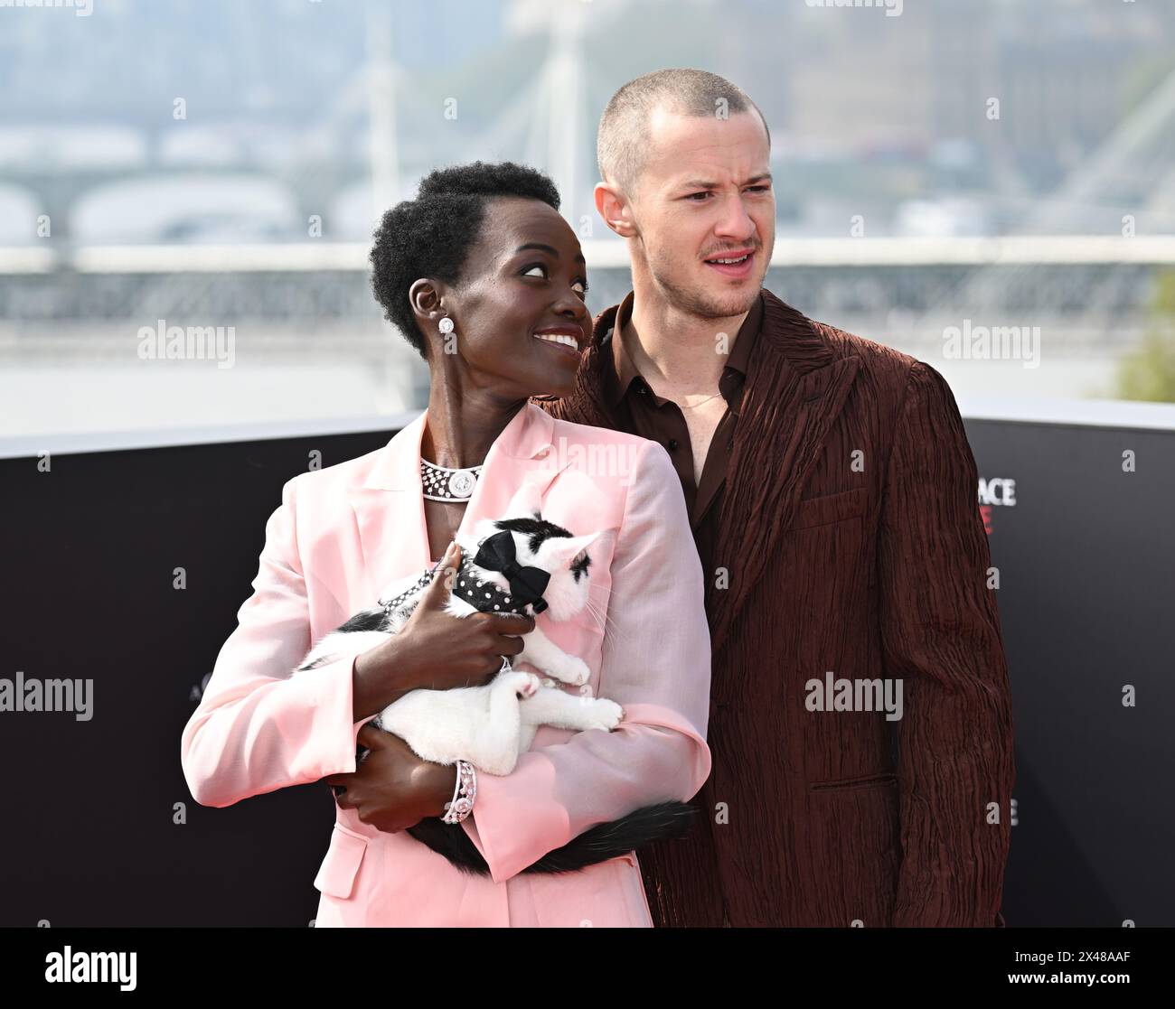 London, UK. May 1st, 2024. Lupita NyongÕo, Joseph Quinn and Frodo the ...