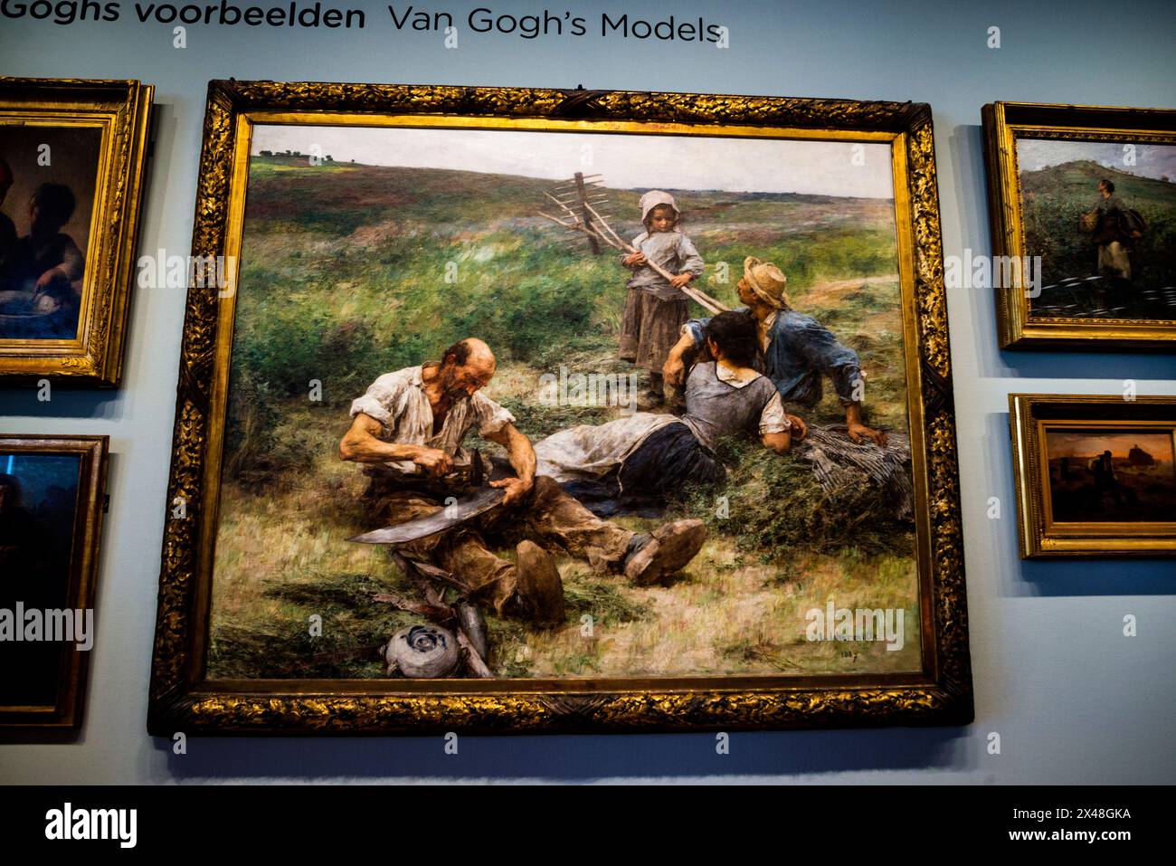 Léon-Augustin Lhermitte Haymaking at the Van Gogh Museum in Amsterdam, Netherlands. Stock Photo