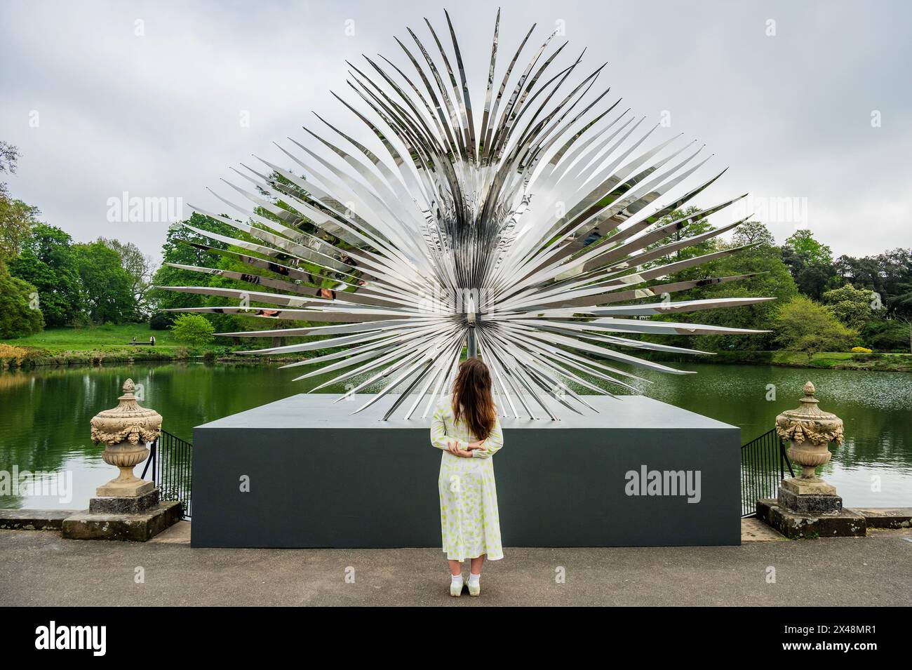 London, UK. 1st May, 2024. Event Horizon (Sabal), 2024, in front of the Palm House pond - Marc Quinn: Light into Life at Kew Gardens. A new exhibition of brand-new works, including outdoor installationss and culptures inside the Temperate House inspired by Kew's plant collection. The exhibition runs from Saturday 4 May - Sunday 29 September. Credit: Guy Bell/Alamy Live News Stock Photo