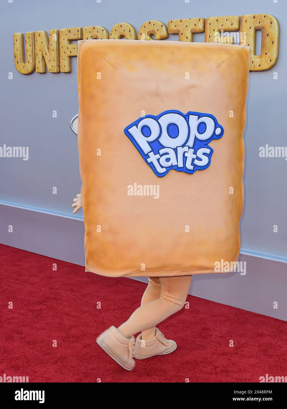 HOLLYWOOD, LOS ANGELES, CALIFORNIA, USA - APRIL 30: A Pop-Tarts character arrives at the Los Angeles Premiere Of Netflix's 'Unfrosted' held at The Egyptian Theatre Hollywood on April 30, 2024 in Hollywood, Los Angeles, California, United States. (Photo by Image Press Agency) Stock Photo