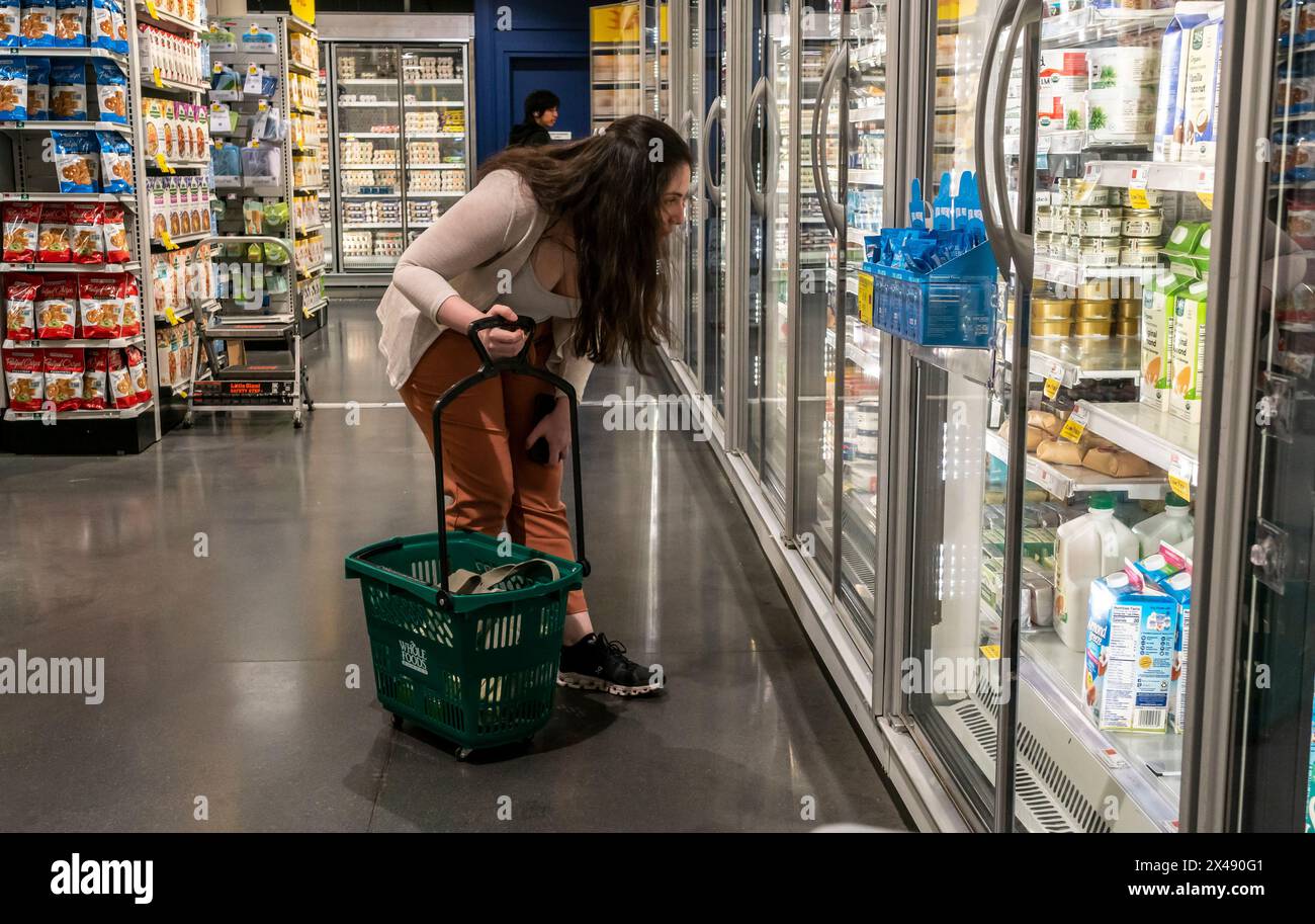 Shopping in a Whole Foods Market supermarket in New York on Tuesday, April 23, 2024. (© Richard B. Levine) Stock Photo