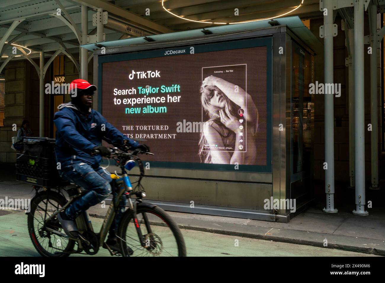 Advertising for the Chinese video platform TikTok promoting Taylor SwiftÕs ÒThe Tortured Poets DepartmentÓ album in Midtown Manhattan in New York on Sunday, April 28, 2024. TikTok, owned by ByteDance, is a platform for users to post short-form mobile videos. (© Richard B. Levine) Stock Photo