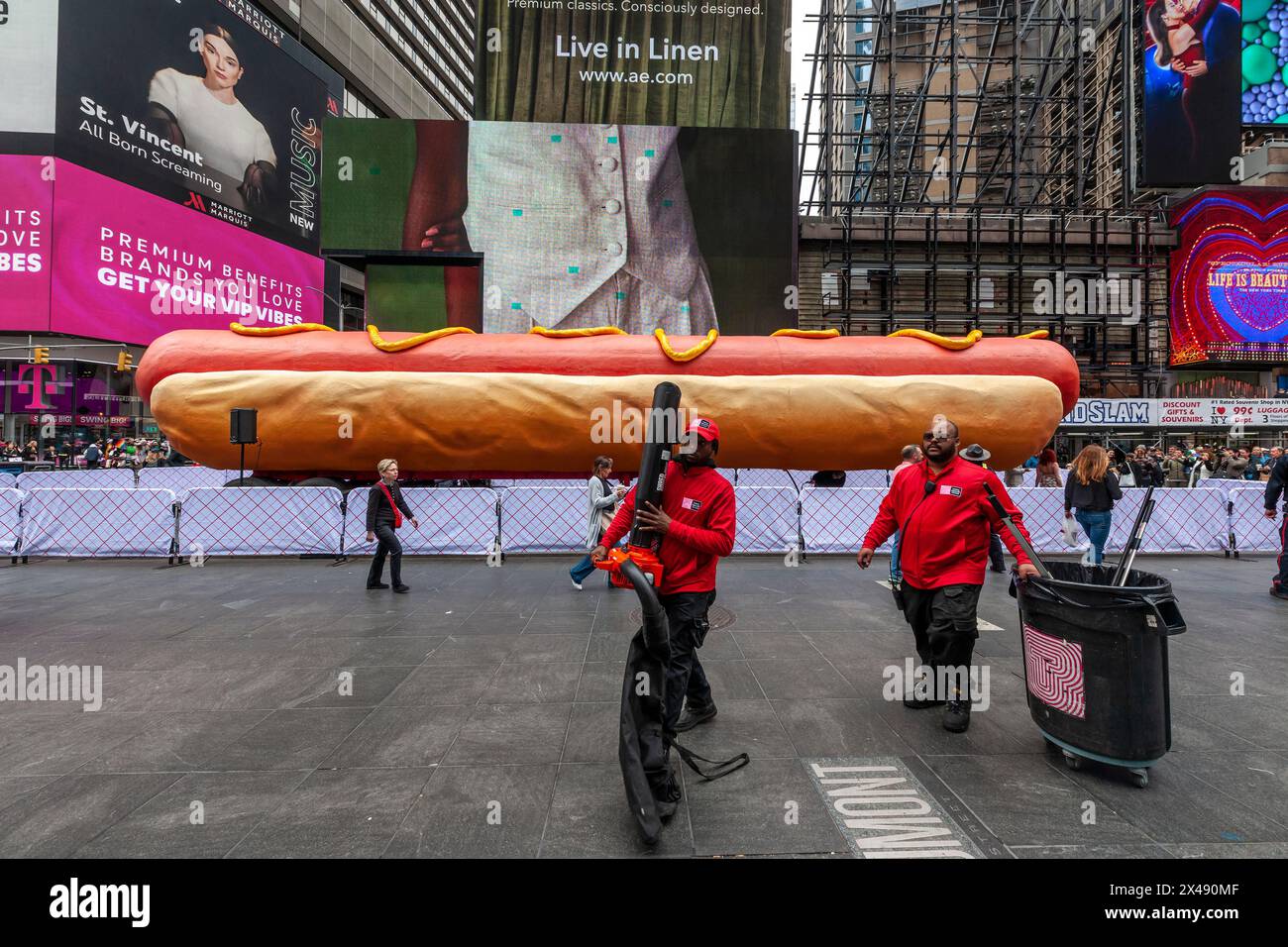 “Hot Dog in the City”, by the artists Jen Catron and Paul Outlaw in Times Square in New York on Tuesday, April 30, 2024. The 65 foot long animatronic hot dog sculpture raises up and ejaculates confetti at noon each day. The installation will be on display until June 13.(© Richard B. Levine) Stock Photo