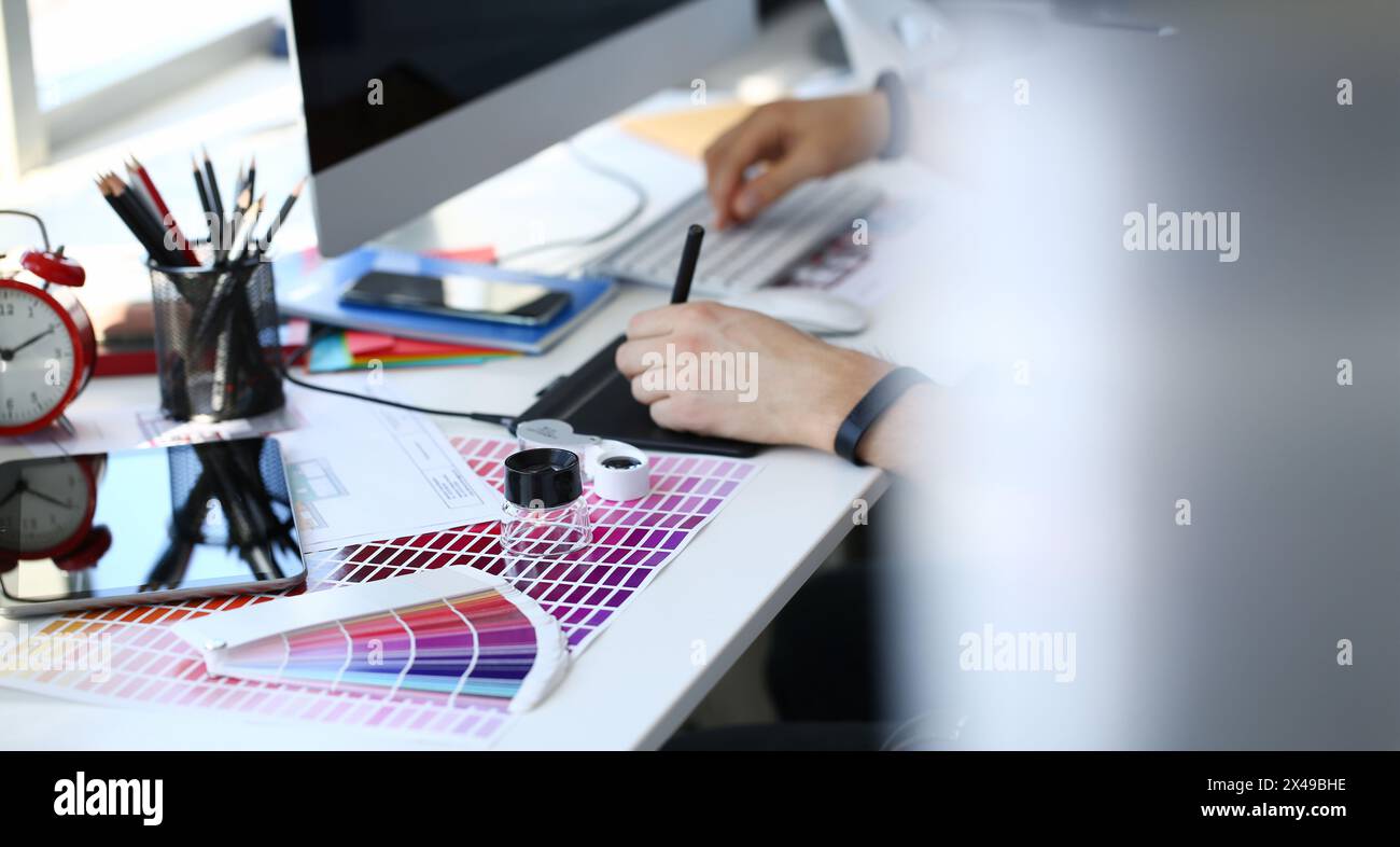 Test print paper page with colour test design fantail and magnifying ...