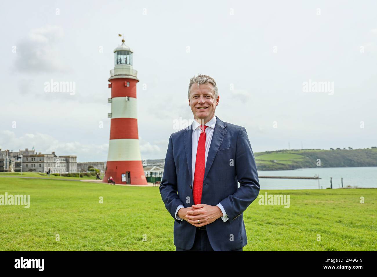 Labour Member of Parliament, Luke Pollard, on Plymouth Hoe with Smaton’s Tower as a backdrop. Cropable with copy and header space. Stock Photo