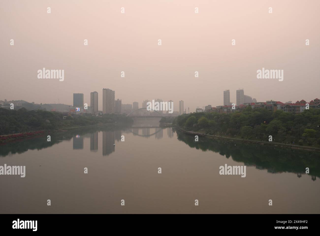 Baise City, Guangxi, China - March 30, 2023: Scenery of Youjiang River in Baise City under air pollution weather Stock Photo