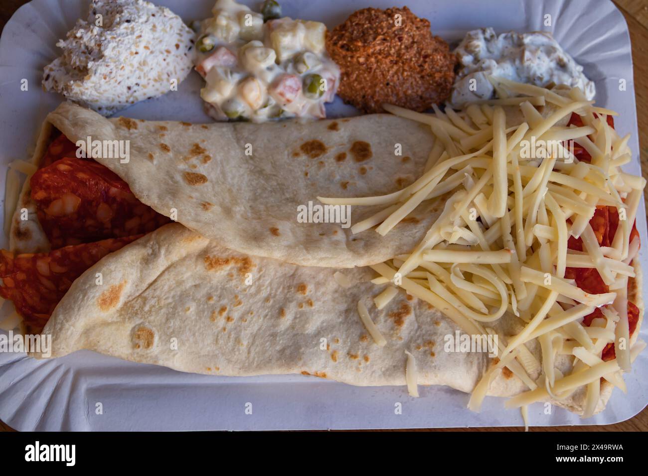 Delicious sausage and cheese burrito wrap a lowcalorie, fastfood snack bursting with flavor