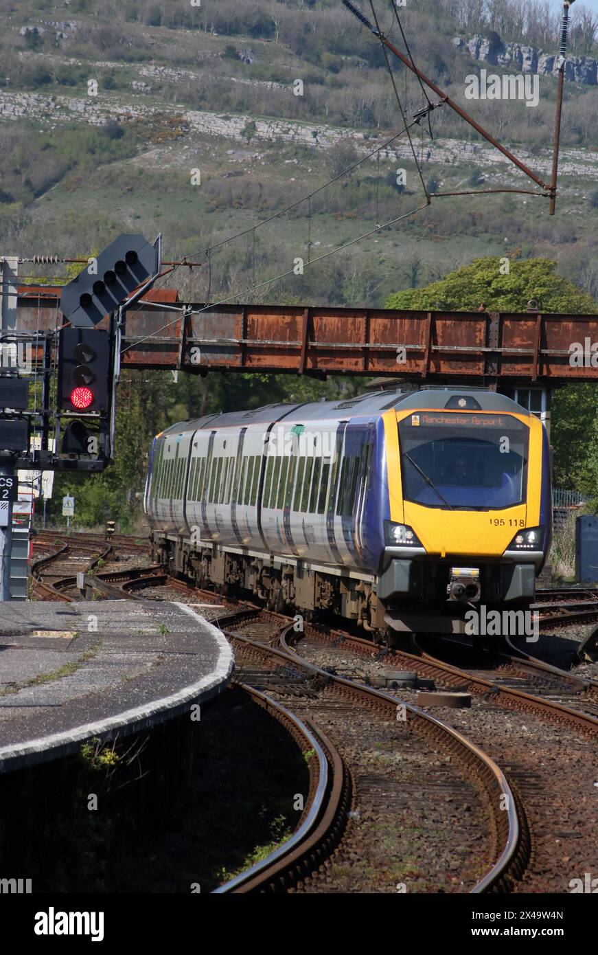 Two Northern trains class 195 civity diesel multipleunits arriving at Carnforth station with