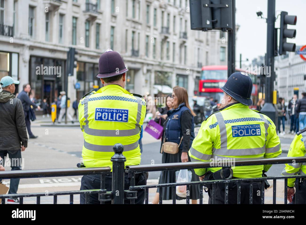 LONDON- APRIL 4th, 2024: Three Met Police officers on patrol on Oxford Street Regent Street Stock Photo