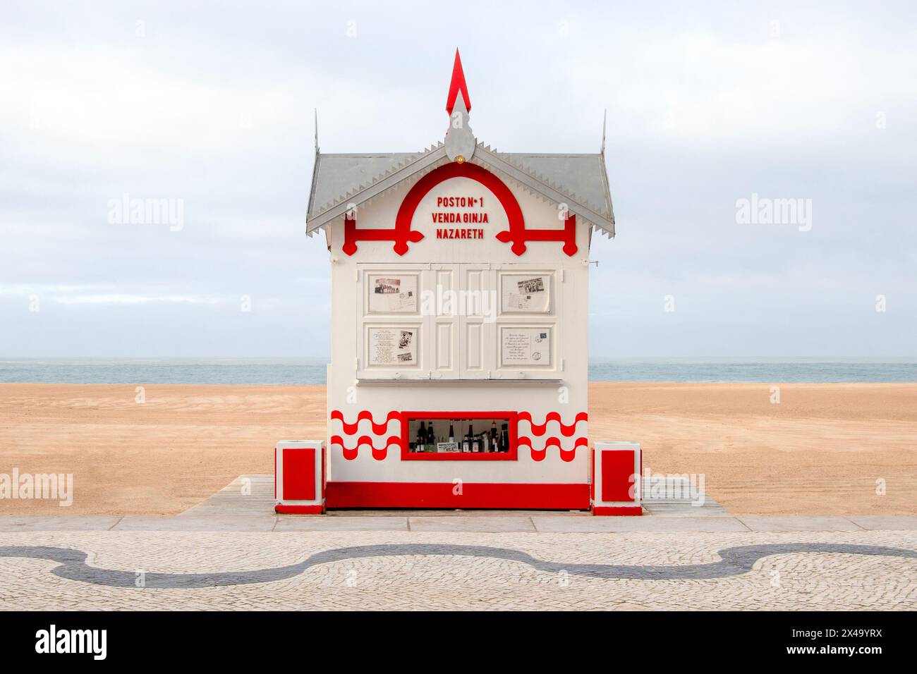 Red and white retro Kiosk by the beach. Nazaré, Portugal Stock Photo