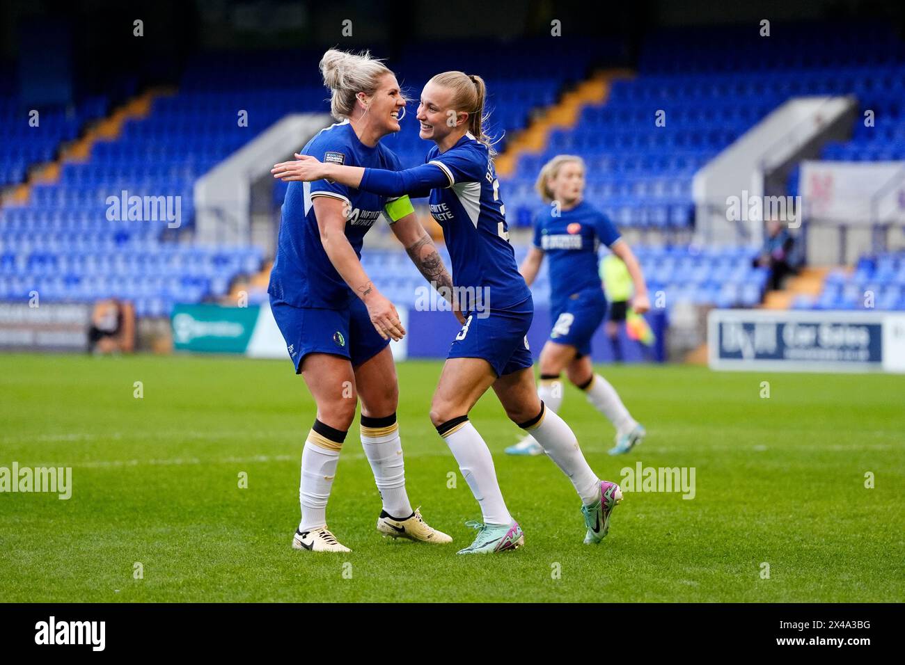 Chelsea's Aggie Beever-Jones celebrates scoring the opening goal of the game with team-mate Millie Bright (left) during the Barclays Women's Super League match at Prenton Park, Birkenhead. Picture date: Wednesday May 1, 2024. Stock Photo