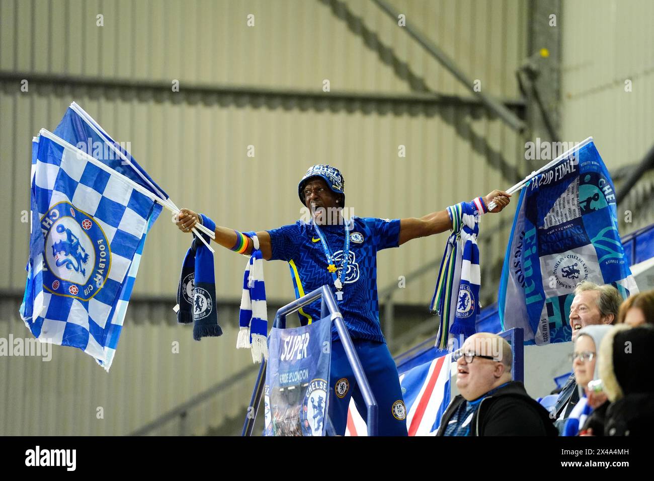 A Chelsea fan shows their support in the stands during the Barclays Women's Super League match at Prenton Park, Birkenhead. Picture date: Wednesday May 1, 2024. Stock Photo