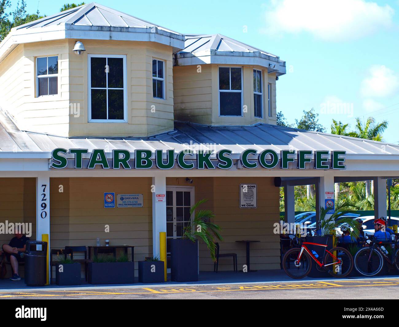 Miami, Florida, United States - April 20, 2024: Starbucks store at Old Cuttler Road in Palmetto Bay with clients. Stock Photo