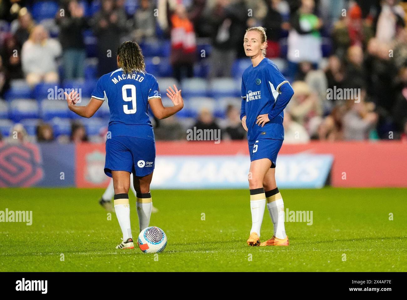 Chelsea's Sophie Ingle (right) and team-mate Catarina Macario stand dejected during the Barclays Women's Super League match at Prenton Park, Birkenhead. Picture date: Wednesday May 1, 2024. Stock Photo