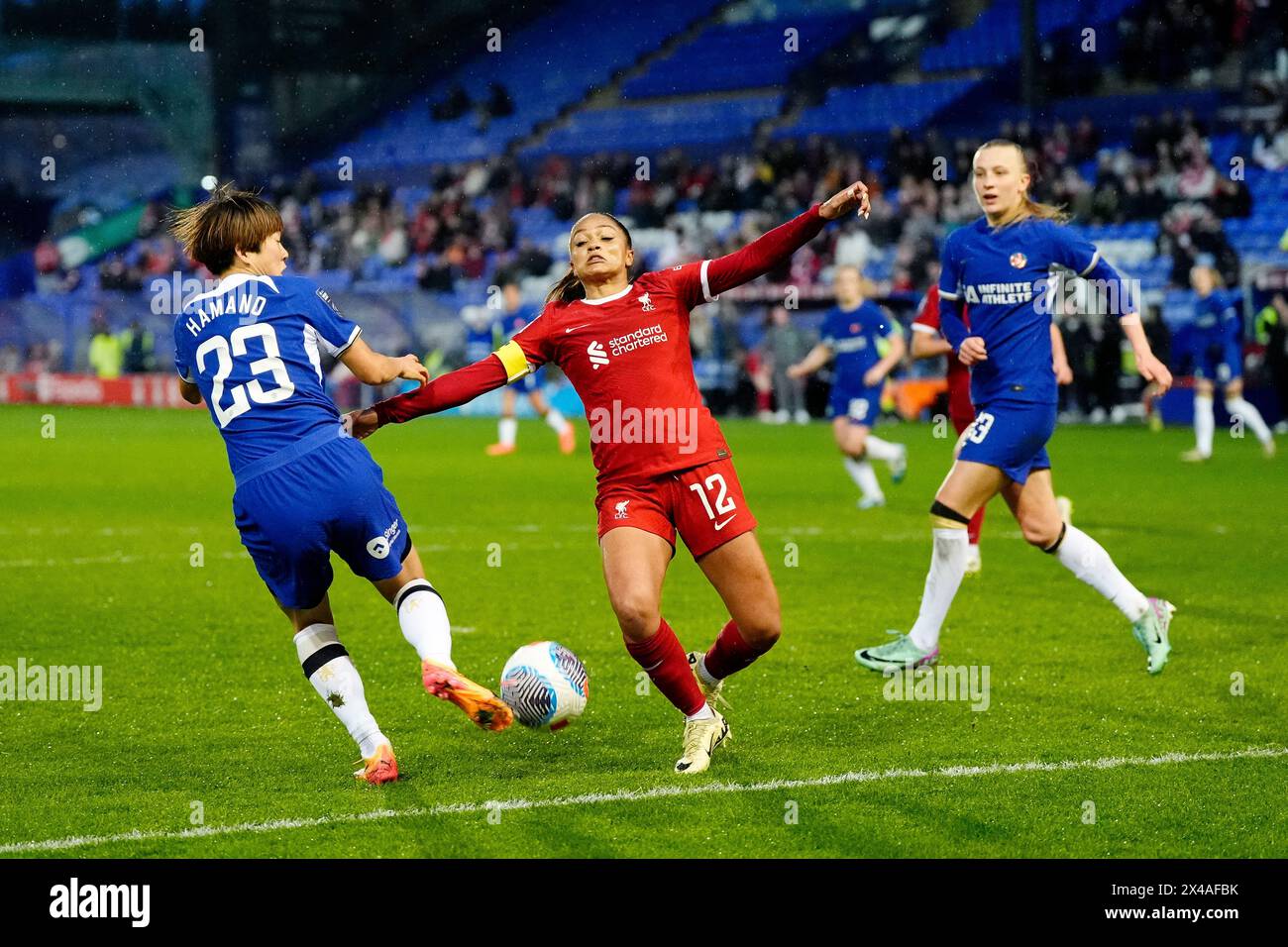 Chelsea's Maika Hamano (left) and Liverpool's Taylor Hinds battle for the ball during the Barclays Women's Super League match at Prenton Park, Birkenhead. Picture date: Wednesday May 1, 2024. Stock Photo
