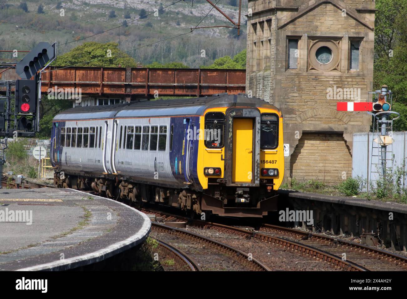 Northern trains super sprinter class 156 diesel multiple unit entering platform 1 at Carnforth railway station with passenger train on 1st May 2024. Stock Photo