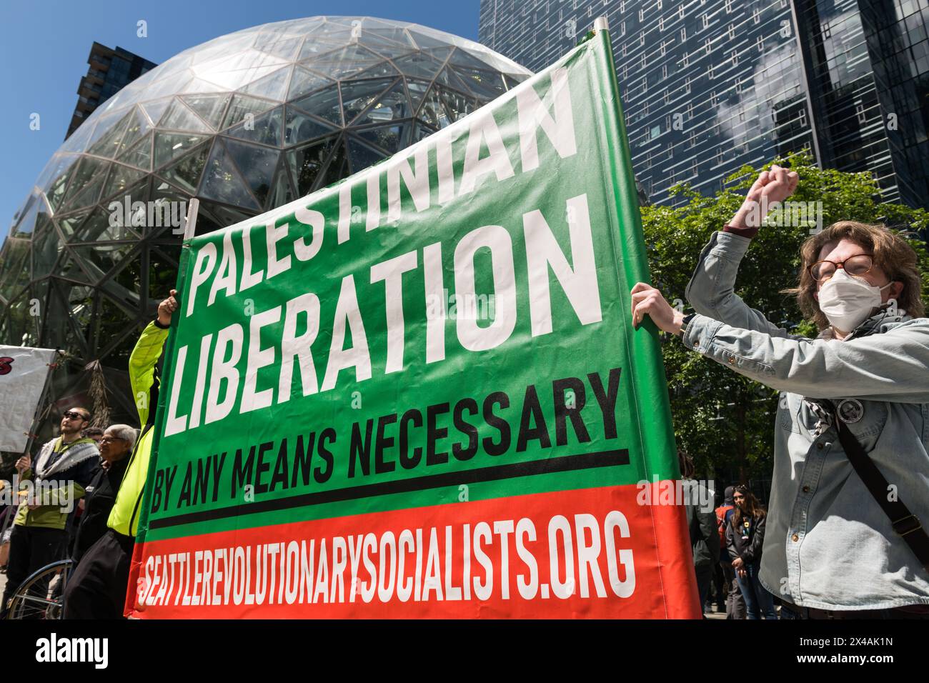 Seattle, USA. 1st May 2024. Protestors in the Seattle May Day March