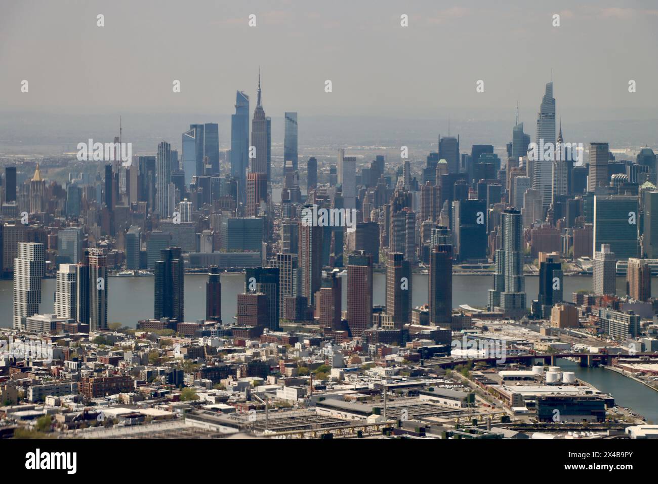 Aerial view of Long Island City with midtown Manhattan in the ...