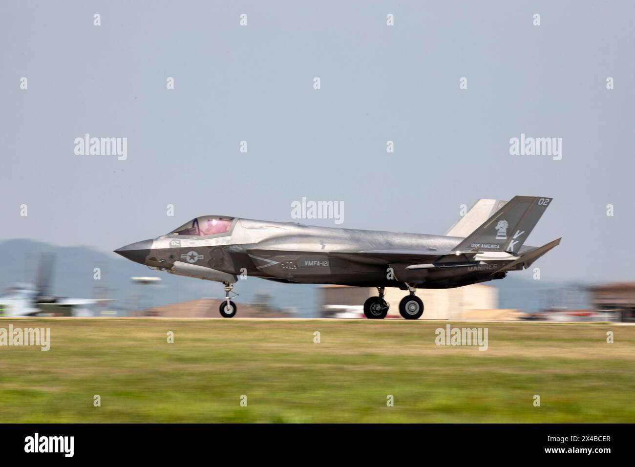 A U.S. Marine Corps F-35B Lightning II aircraft with Marine Fighter Attack Squadron 121, Marine Aircraft Group 12, 1st Marine Aircraft Wing, lands at Stock Photo