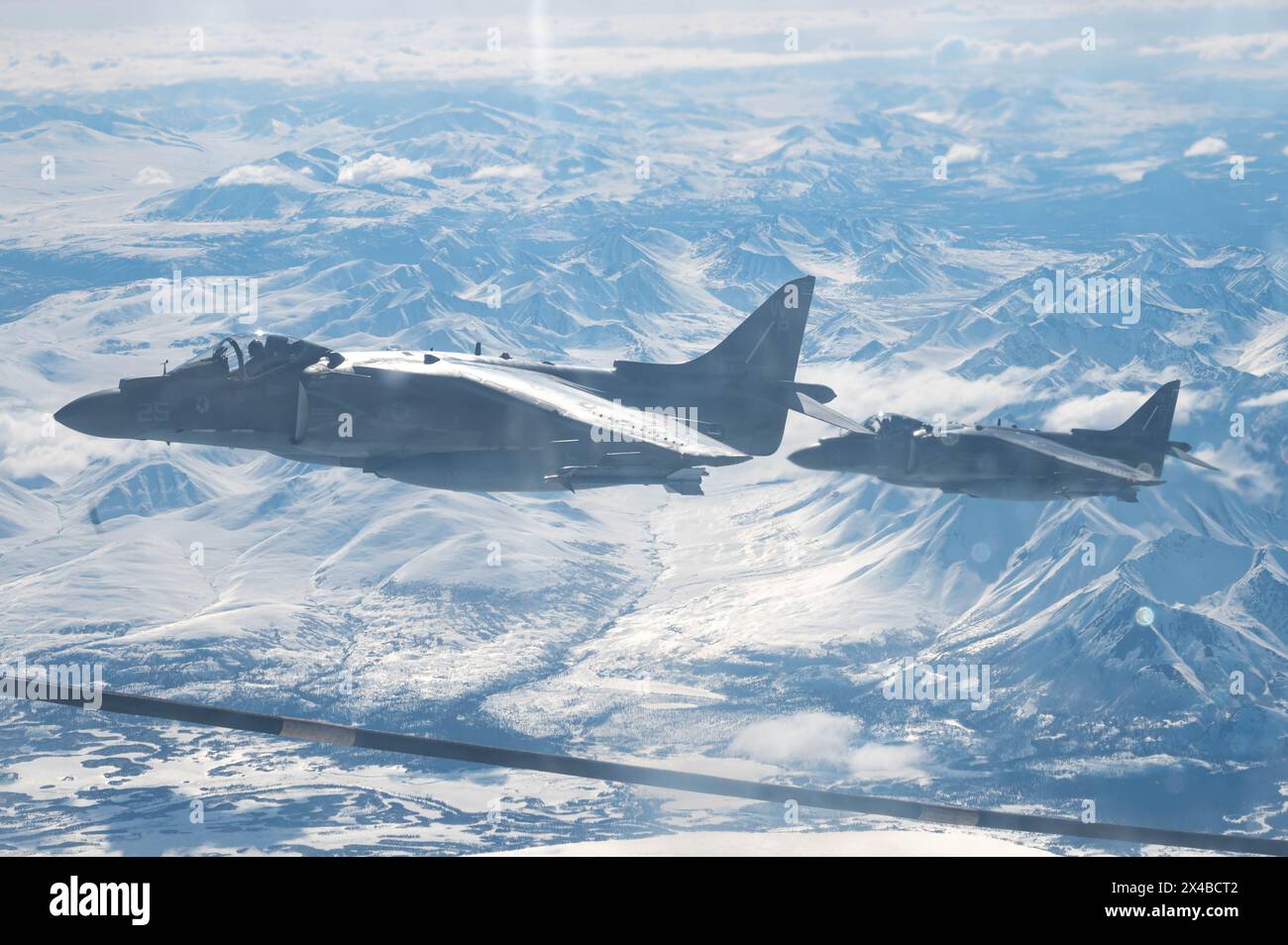 Two AV-8B Harrier II’s assigned to the Marine Attack Squadron (VMA) 223 fly in the Joint Pacific Alaska Range Complex during Red Flag-Alaska 24-1, Ala Stock Photo