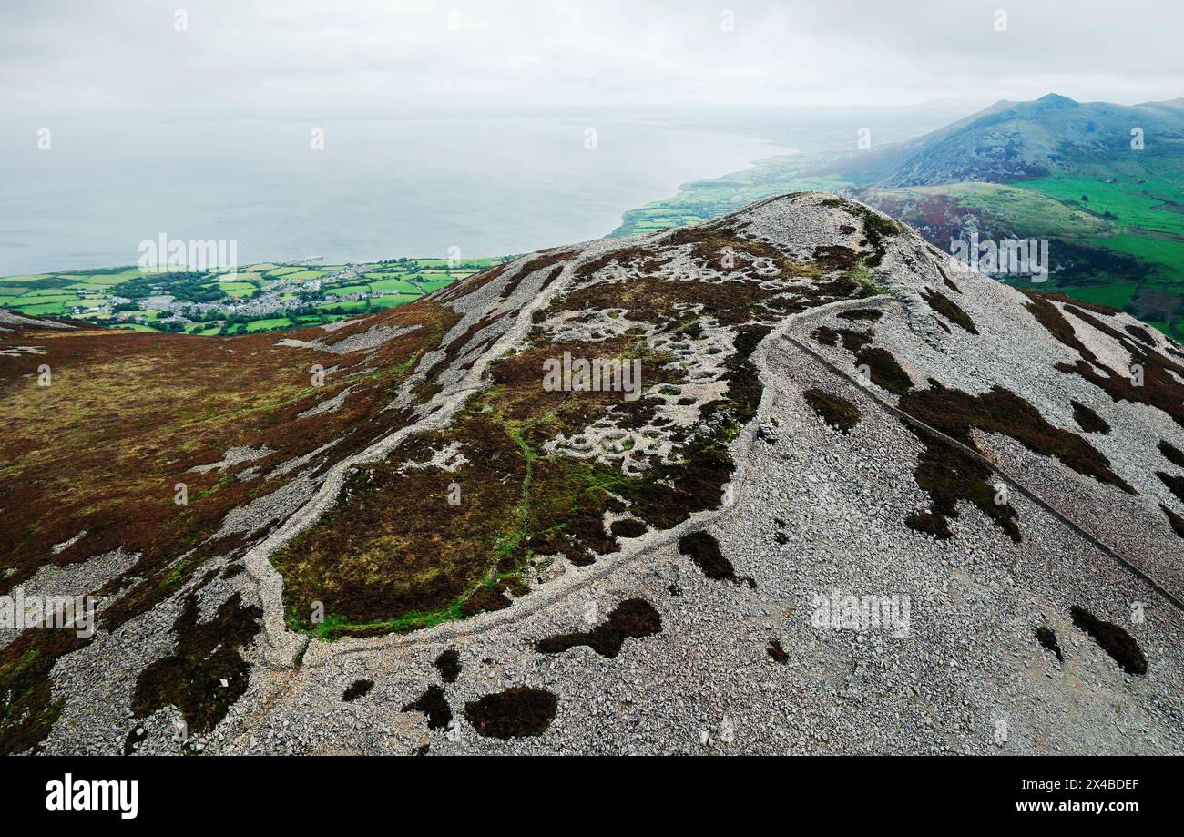 Tre’r Ceiri Iron Age settlement hillfort on Llyn Peninsula, north Wales. 200 BC through 400 AD. Massive 4m walls and stone hut circles. Looking north Stock Photo