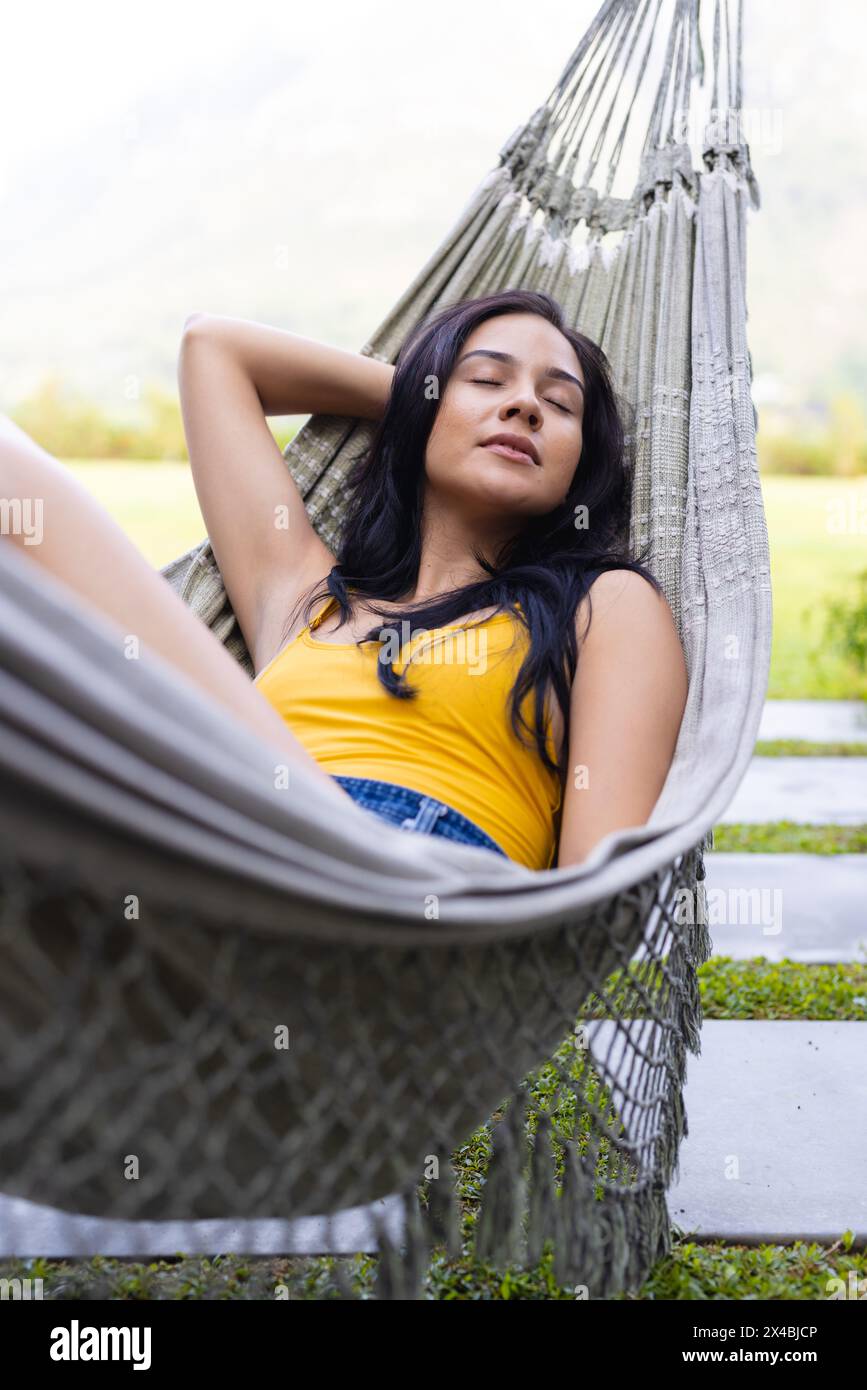 Wearing red top and blue jeans hi-res stock photography and images - Alamy