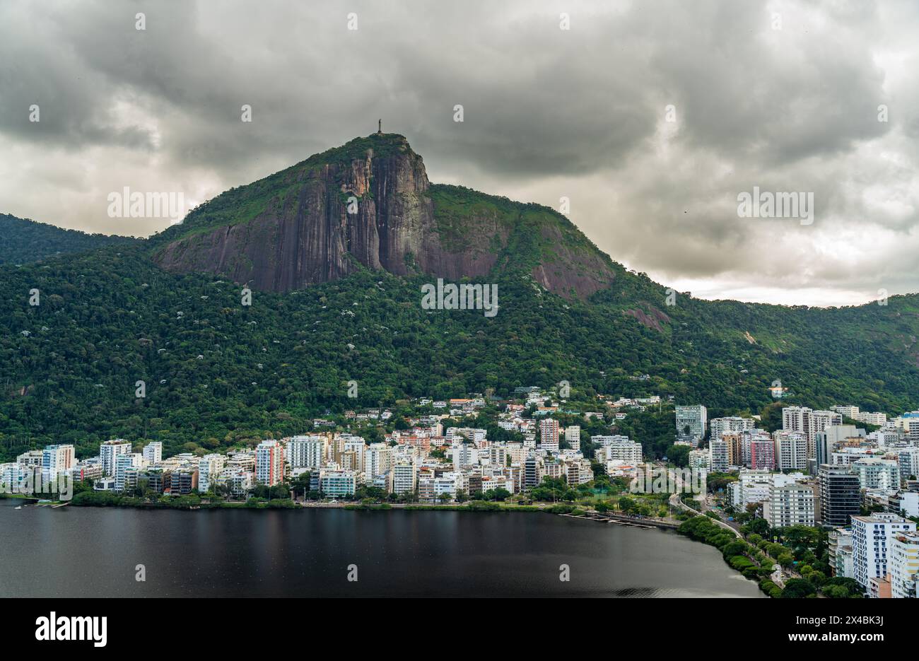 Dramatic Clouds Hovering Above Christ the Redeemer in Rio Stock Photo