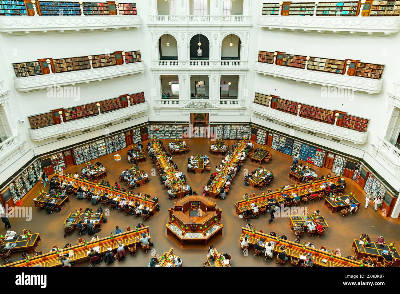 MELBOURNE, AUSTRALIA - APRIL 12, 2024: People in the La Trobe Reading Room at State Library Stock Photo