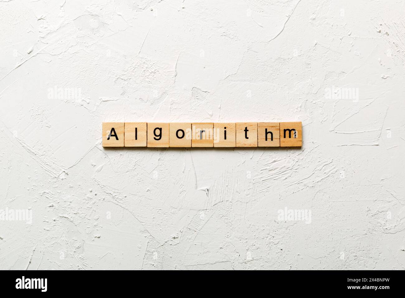 Algorithm word written on wood block. Algorithm text on table, concept. Stock Photo