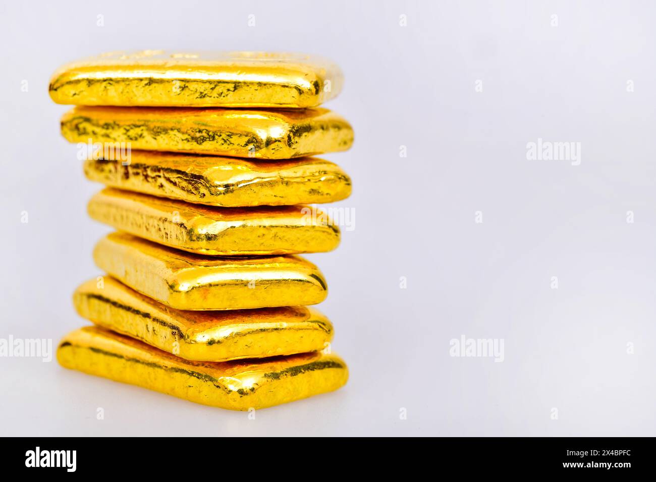 Close up photo a gold bars on white background Stock Photo