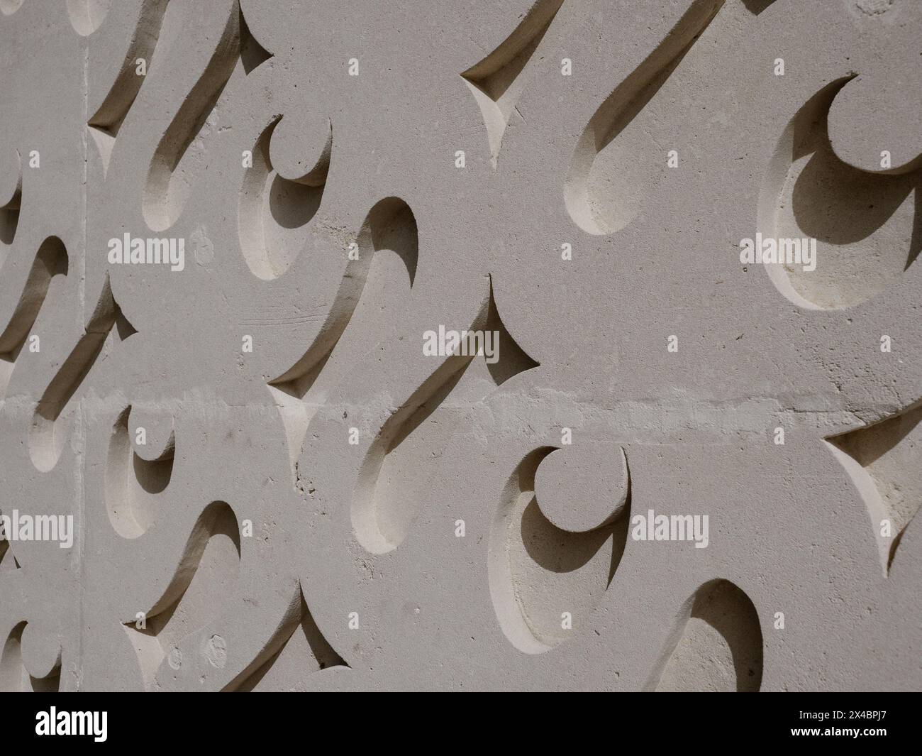 Wall ornament with a curling pattern made with limestone Stock Photo