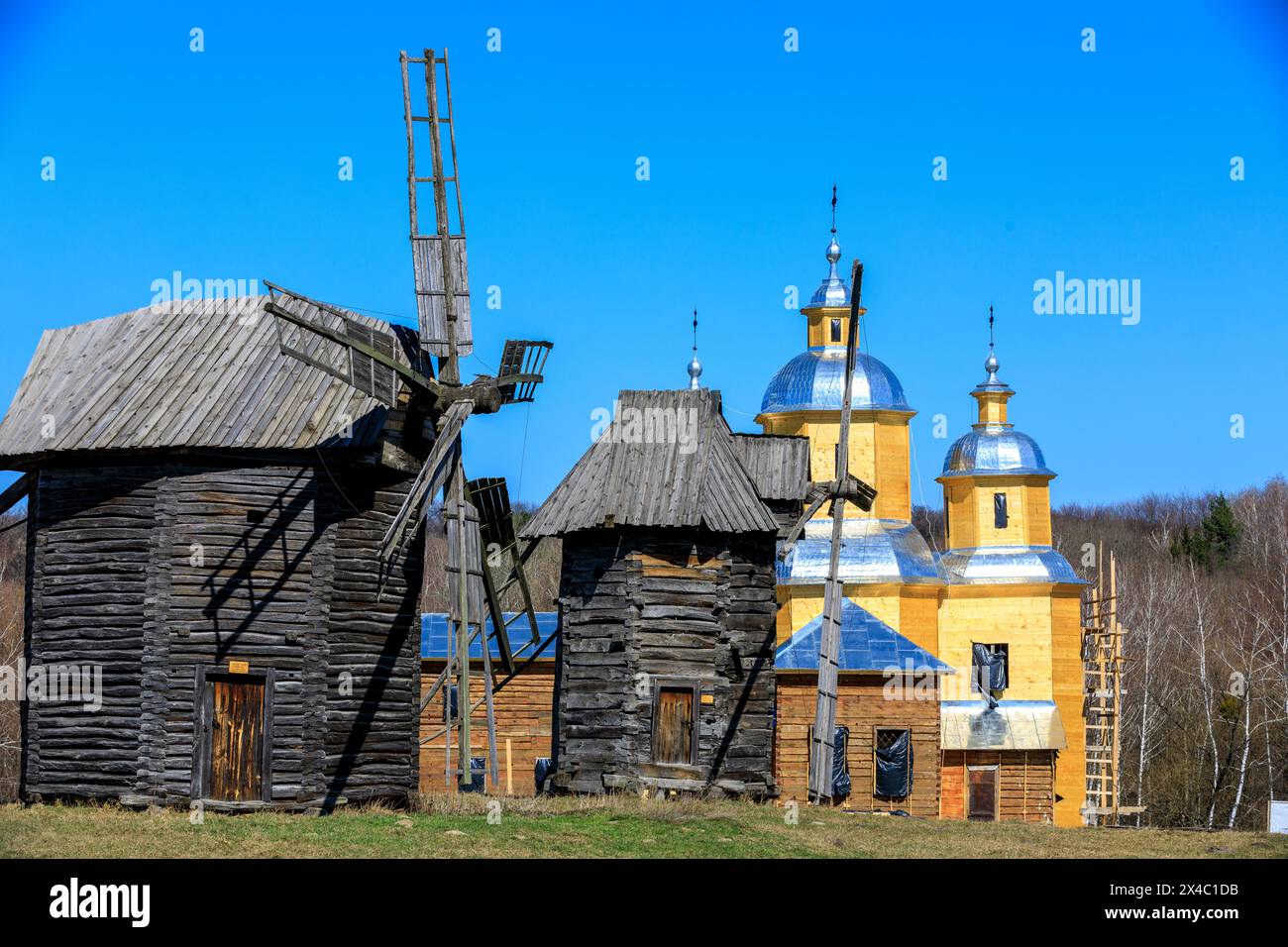 Ukraine, Kiev, Kyiv. Pyrohiv, also Pirogov, a village south of Kiev. Now home to an outdoor Museum of Folk Architecture and Life of Ukraine. Wooden Windmills. Stock Photo