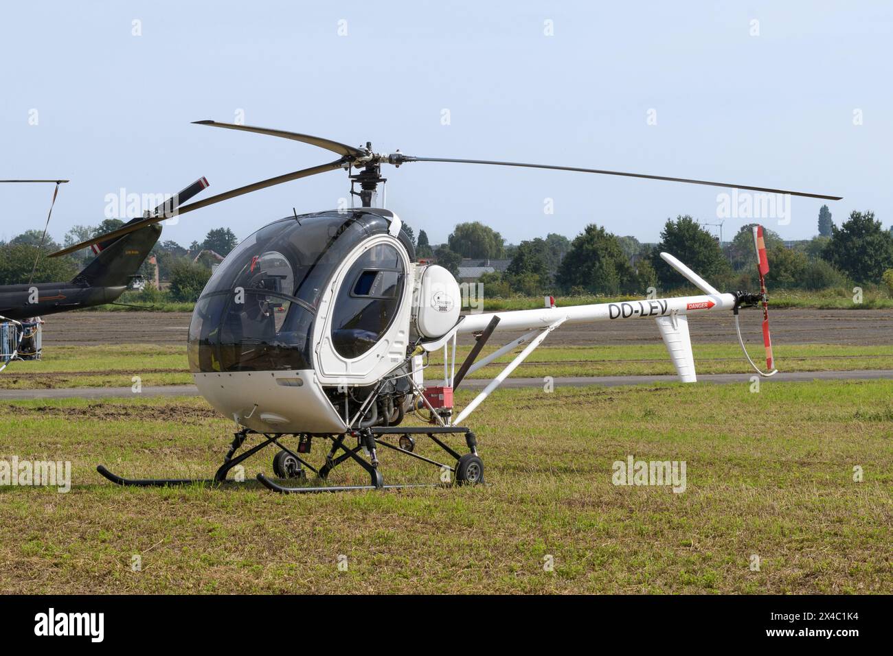 Helicopter Schweizer 300c Public  airshow of vintage aircraft  at the Sint Truiden Aero Club. Sint Truiden. Limburg - Belgium 03-09-2023 Stock Photo