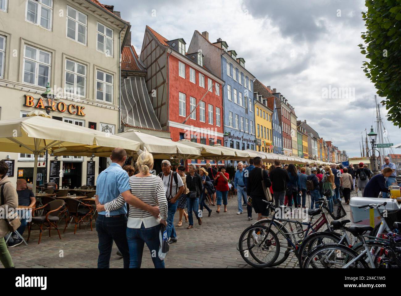 Copenhagen, Denmark, Large Crowd People Walking, on Street Scene, Nyhavn Canal, Historic City Center Stock Photo