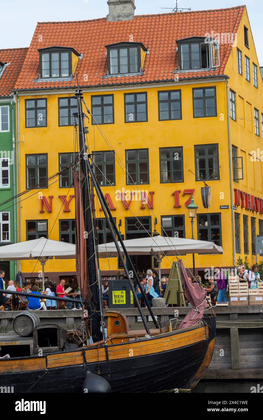 Copenhagen, Denmark, Large Crowd People Tourists, Visiting on Street Scene, Nyhavn Canal, Historic City Center Stock Photo