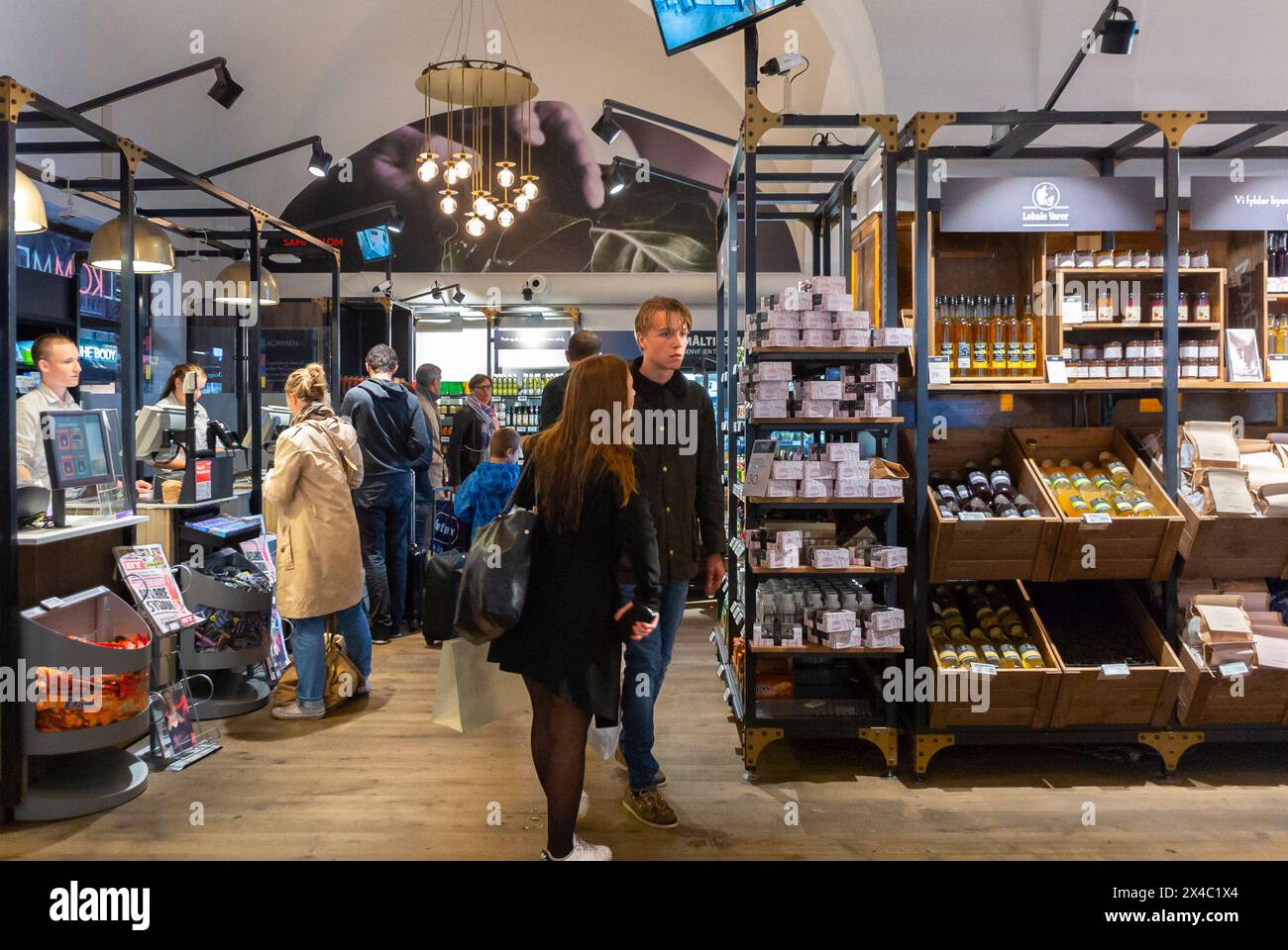 Copenhagen, Denmark, Young People, Teenagers Shopping inside Local Food Store in Train Station Stock Photo